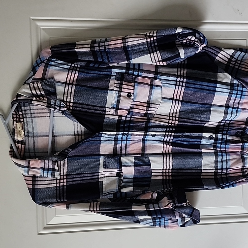 Pink and blue plaid shirt.